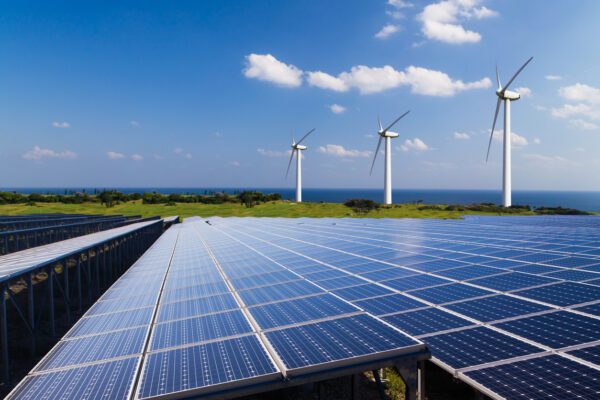 Renewable energy projects; solar panel farms and wind turbines.