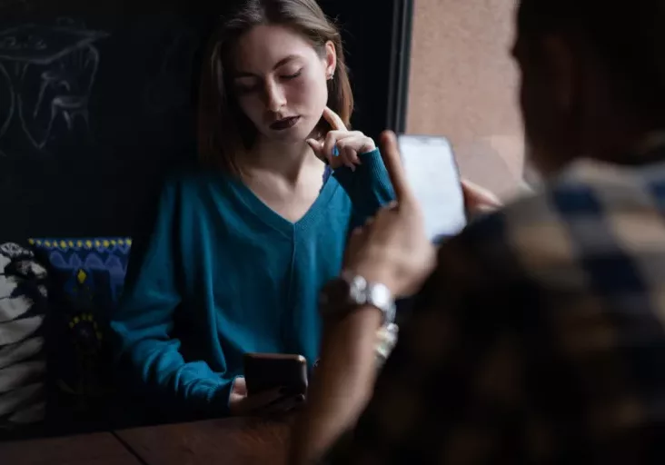 Young couple on their mobile phones.