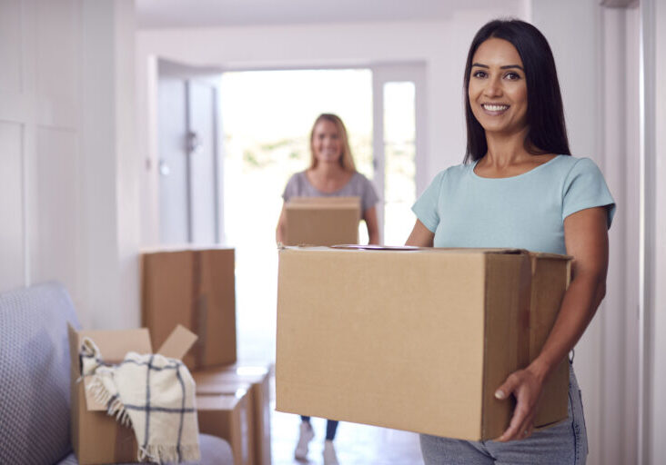 Female-couple-moving-into-house