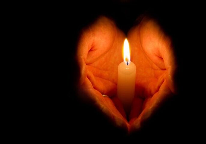 Hands-with-a-Candle-1080x675-1-1 Hands-with-a-Candle-1080x675-1-1