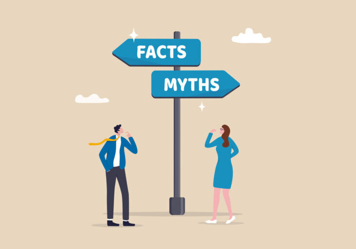 Fact vs Myth, truth or false information to make decision, belief or fiction to choose to believe, trustworthy, fraud or wrong direction concept, business people at Facts vs Myths directional sign. Fact vs myth, truth or false information to make decision, belief or fiction to choose to believe, trustworthy, fraud or wrong direction concept, business people at facts vs myths directional sign.