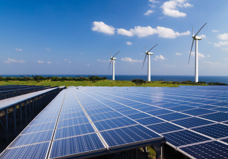 Renewable energy projects; solar panel farms and wind turbines.